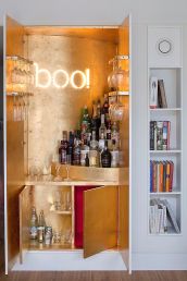 Gold-leaf-sheets-and-illuminated-sign-for-the-wardrobe-home-bar